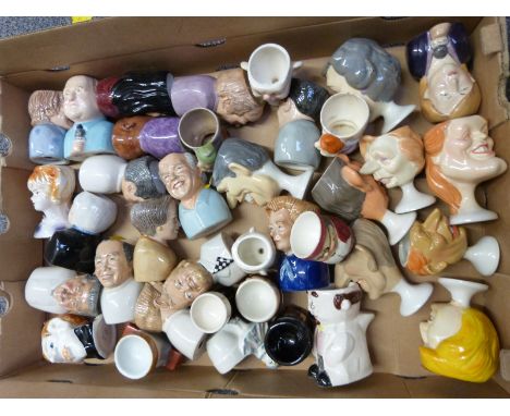 Approximately 40&nbsp;mostly figural egg cups mostly Barstow Manor including Spitting Image, Goebel etc