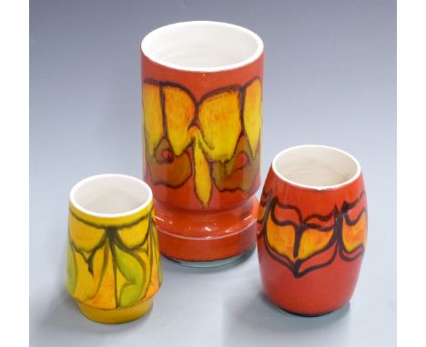 Three Poole pottery Delphis vases, tallest 22cm