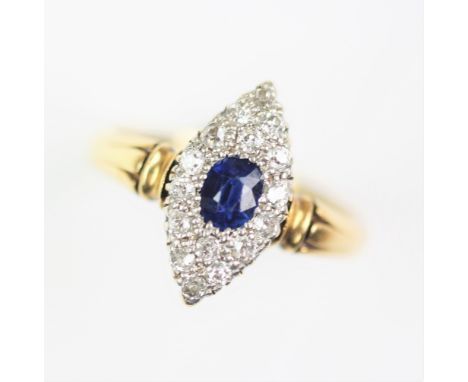 A diamond and untested sapphire set marquise shaped ring, probably Alabaster and Wilson early 20th century, the cluster desig