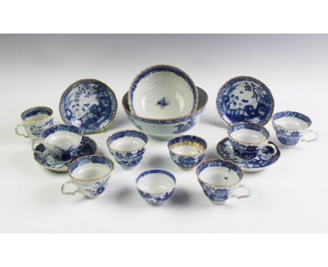 An 18th century Chinese porcelain part tea service, comprising: six teacups, four saucers and a slop bowl, with a sgraffito b