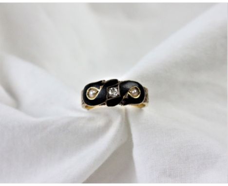 A Victorian mourning ring, Chester 1898, designed as a central black enamelled panel set with a central diamond flanked by tw