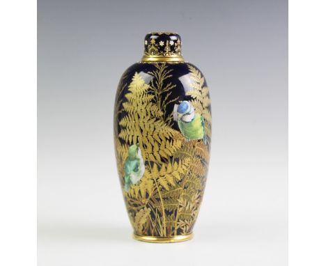 An unusual Coalport enamelled vase and cover, late 19th century, of high shouldered urn form externally decorated with two bl