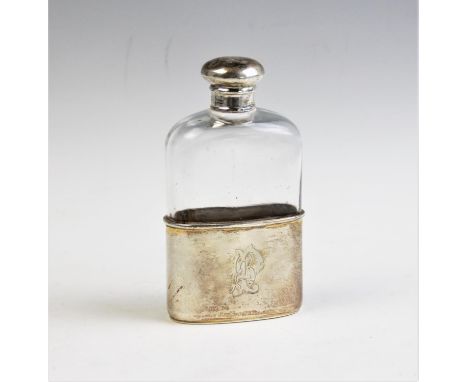 A Victorian silver mounted glass hip flask, Thornhill &amp; Co, London 1882, with screw cap, plain glass body and monogrammed