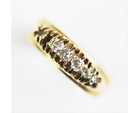 A diamond set ring, designed as five graduated claw set old brilliant cut diamonds (lacking two, was seven), all set in yello