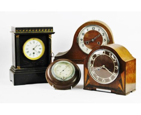 A Victorian polished slate mantel clock of architectural form, white enamel face with black roman numeral dial, 30cm high, wi