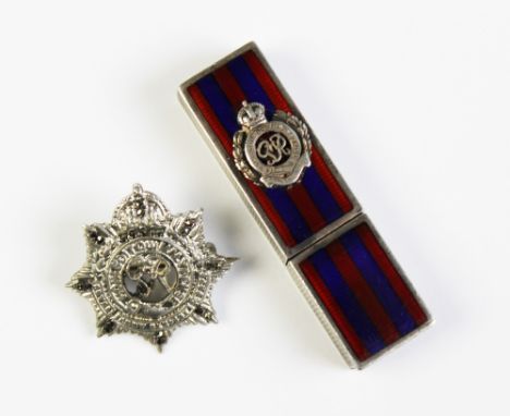 Military Interest: A Royal Engineers white metal and enamel wax seal holder, of rectangular form, with engine turned sides an