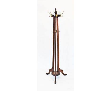 A 19th century style coat stand, walnut with tripod base and brass hooks, 192cm high