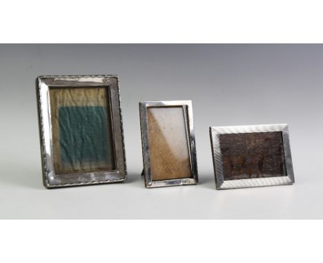 A George V silver photograph frame, William Neale &amp; Son, Birmingham 1911, with ribboned reeded border, 16.5cm high, with 