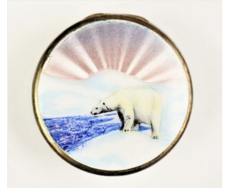 A Norwegian silver and enamelled circular box, the cover depicting a polar bear against a radiating guilloche enamel sunset, 