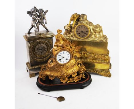 Three French 19th century gilt metal clocks, to include; a figural example under a glass dome, 9cm white enamel dial, two tra