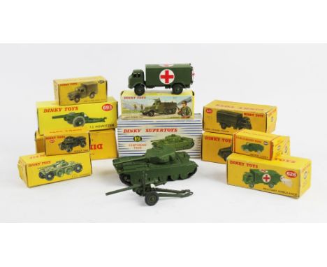 A collection of Dinky Toy military vehicles, comprising; a 651 Centurion Tank, a 673 Scout Car, a 641 1-Ton Cargo Truck, a 06