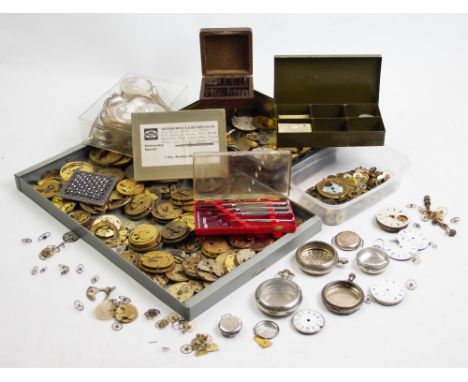 A quantity of pocket watch movements, crystals, springs, balance wheels, dust covers, enamel faces, watch cocks, cogs, silver
