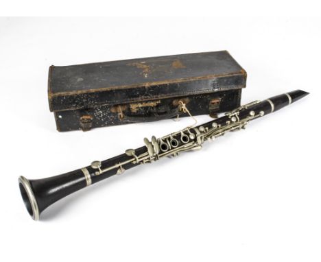 Clarinet, a wooden clarinet stamped Orsi, Milano - some scratches but no obvious faults - comes in small leather case 