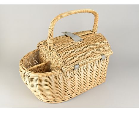 A Wicker Picnic Hamper of Boat Form with two hinged lids to fitted interior having Cutlery, Plates Etc, Two Bottle Holders, 4