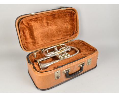 A Mid 20th Century Cased Cornet with Instruction Booklet