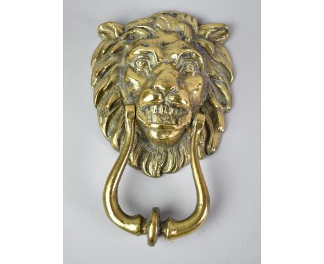 A Large Moulded Brass Lion Mask Door Knocker, Mask 15cms High