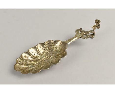 A Continental White Metal Wine Tasting Spoon, Scalloped and Embossed Bowl and Having Cherub Decoration to Stem and Dancing Bo