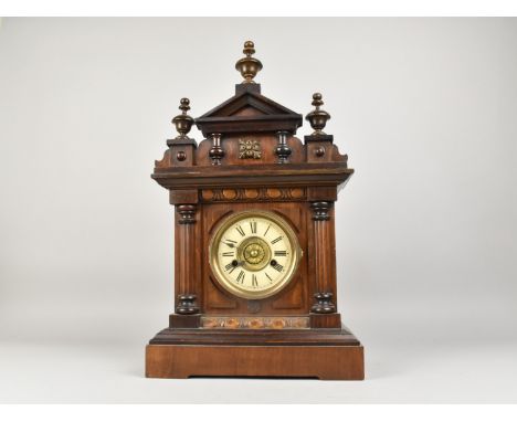 An Edwardian "Bugler" Alarm Clock by Thomas Fattorini, Skipton, Complete with Key and Pendulum. Eight Day Movement, Working O