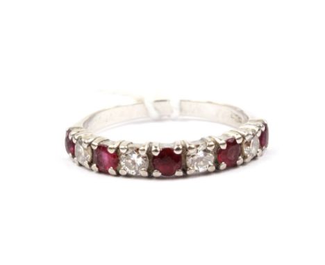 A ruby and diamond half eternity ring