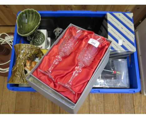 A pair of Bohemian crystal champagne flutes, boxed, a Sylvac jug of tree trunk form with squirrel and various other glassware