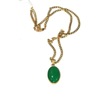 A 9 carat gold flat link neck chain set with a cabachon jade pendant