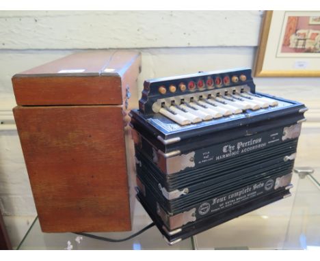 'The Peerless Harmonic Accordion' in a timber box