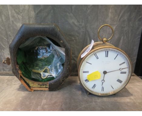 A brass circular table clock, the enamel dial inscribed George Blackie, Strand, the single train balance wheel movement stamp