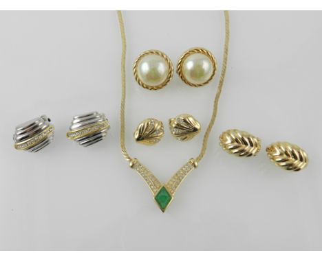 Christian Dior. Four pairs of earrings, together with a gold coloured necklace set with a green stone. 