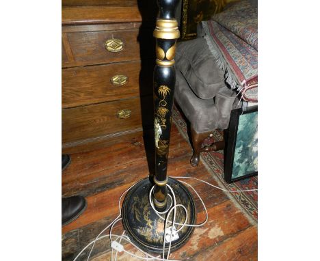 A 1920's black lacquered chinoiserie stand lamp. 