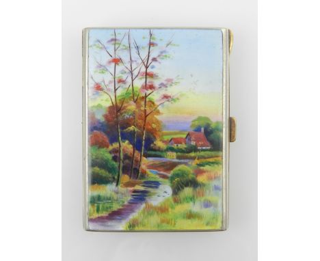 An early 20th century gilt metal cigarette case, the hinged top polychrome decorated in enamels with a romantic landscape, en