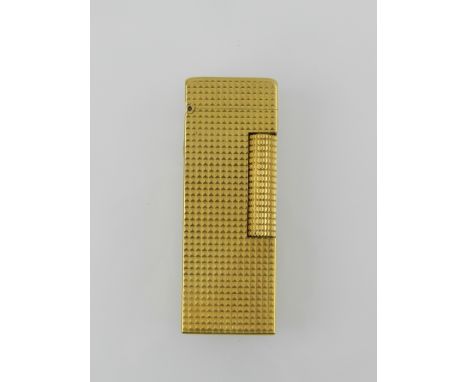 Dunhill, London. A gilt metal mounted 'Rollagas' lighter, with case. H.6.5cm 