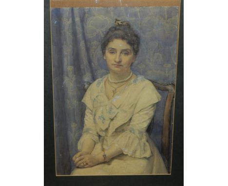 Maria Louisa Angus (British, 1863-1934), a half length portrait of a seated lady in white lace gown with collar, signed upper