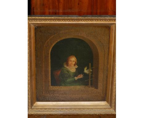19th century Dutch School, a half length portrait of a seated noble women feeding a Cockatoo in an archway in the 17th centur