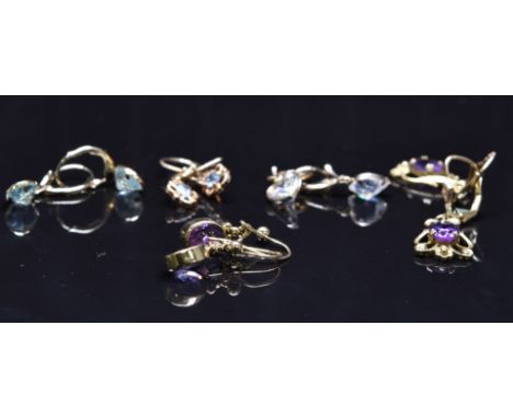 Five pairs of 9ct gold earrings set with amethyst, topaz and cubic zirconia, 10.6g&nbsp;