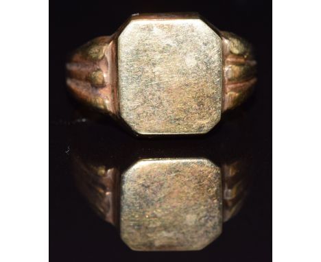 A yellow metal signet ring, size R/S, 5.4g