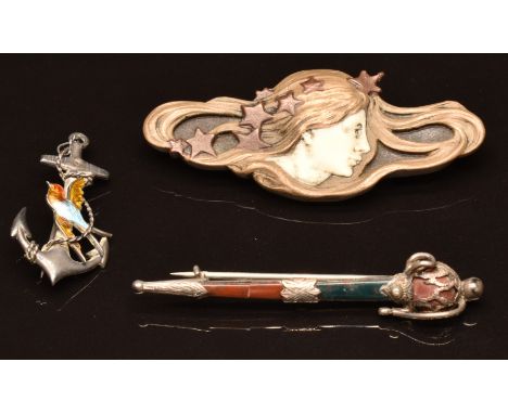 Victorian silver brooch set with agate, a silver anchor and bird brooch set with enamel and an Art Nouveau brooch&nbsp;