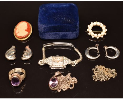 A collection of jewellery including silver earrings, silver ring and pendant set with an amethyst, etc