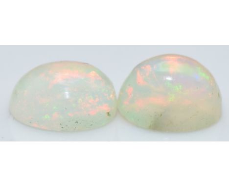 Two loose oval opal cabochons, total approximately 1.52cts