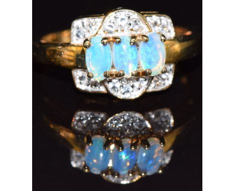 A 9k gold ring set with opal and topaz, size N, 3.3g