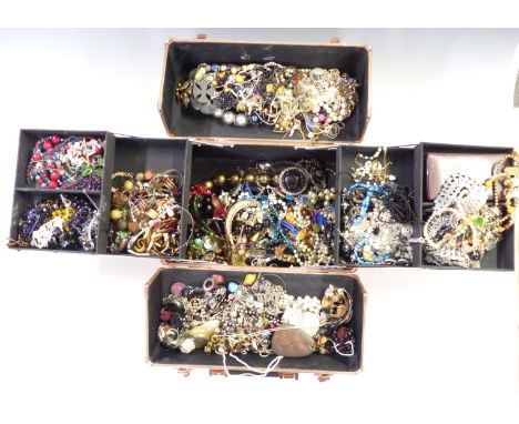 A collection of costume jewellery including vintage earrings and brooches, necklaces, etc