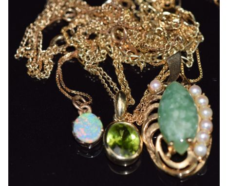 Three 9ct gold pendants, one set with opal, one with seed pearls and quartz and the other peridot, all on 9ct gold chains, 11