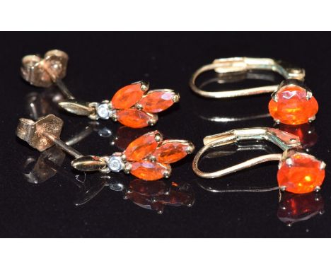 Two pairs of 9ct gold earrings, one set with fire opal the other fire opal and diamonds, 3.2g&nbsp;