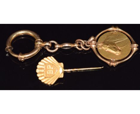 A 9ct gold BP pin (3.4g) and a rolled gold horse pendant/ fob