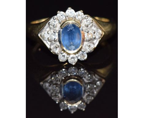 A 9ct gold ring set with an oval sapphire and diamonds, size M, 3.8g