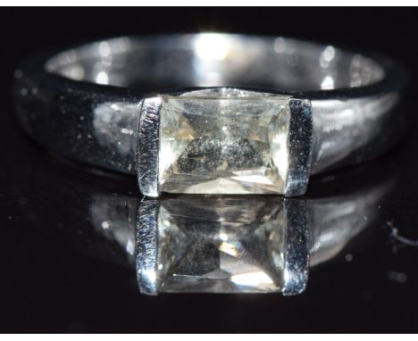 A 9k white gold ring set with a topaz, size N, 4.6g