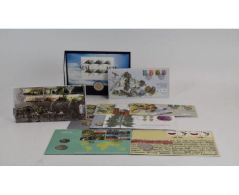 A collection of first day cover coin and stamp presentation packs including millennium, political, Brunel etc