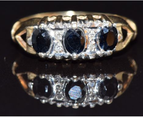 A 9ct gold ring set with sapphires and diamonds, size M, 1.9g