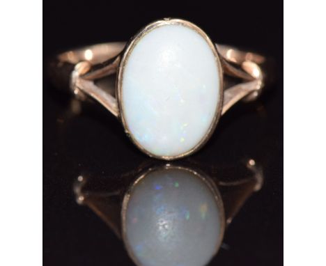 A 9ct gold ring set with an opal, size L, 2.3g