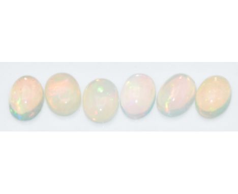 Six loose oval opal cabochons, total approximately 3.10cts