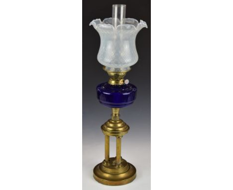 19thC blue glass oil lamp with triple reeded column support and frilled opaque glass shade, H66cm
